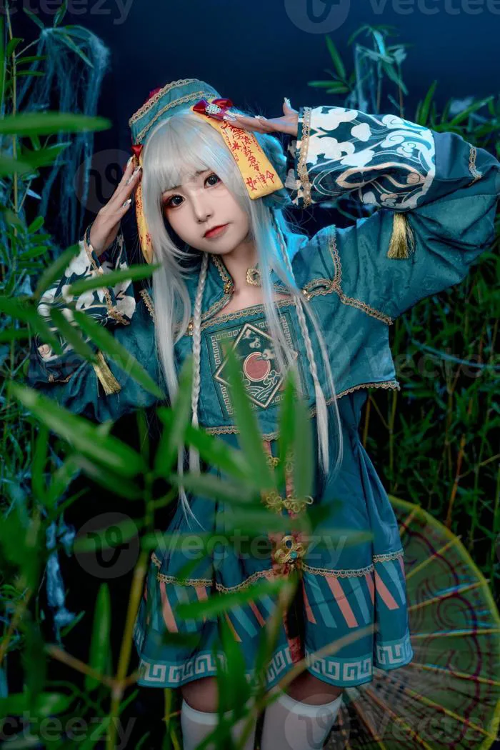 Enchanting Asian Cosplay girl surrounded by bamboo, bringing a whimsical fantasy element to your creative projects with unique beauty and captivating charm 73128530 Stock Photo at Vecteezy